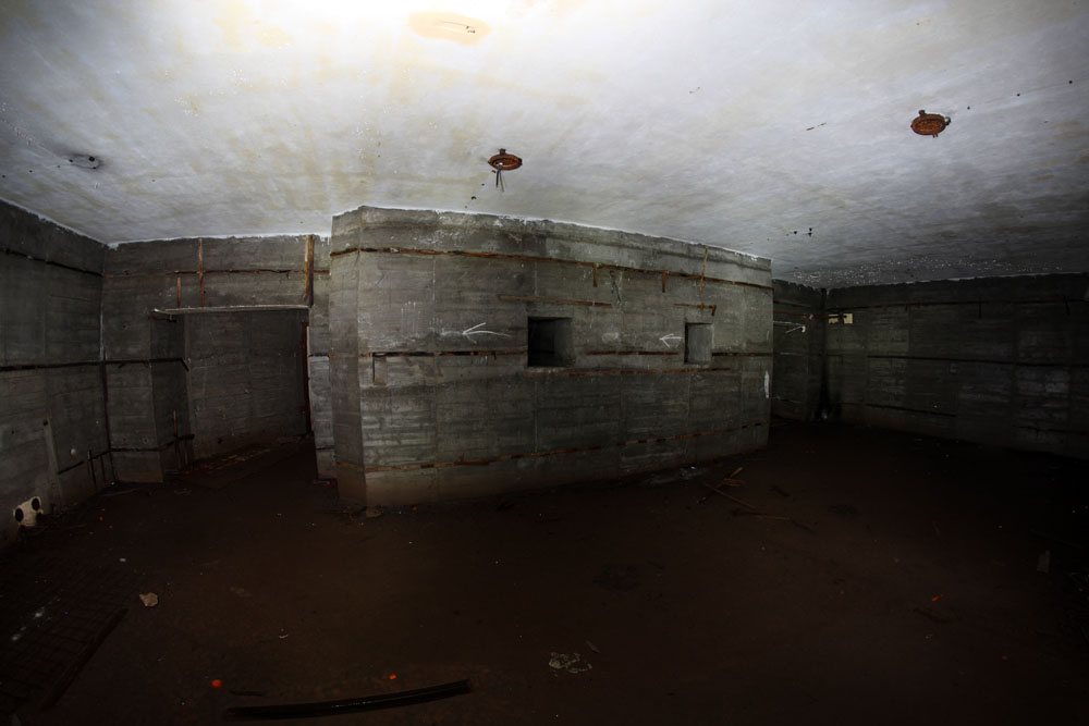 Main plotting room with stereo range finder equipment in rooms ahead.